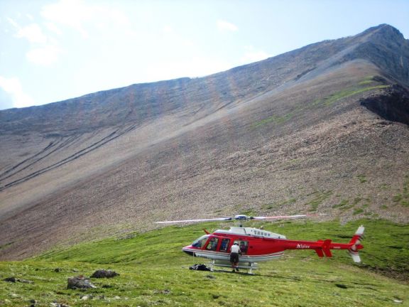 Heli Hiker boards helicopter in Canadian Rockies