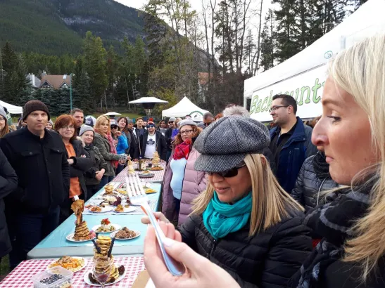 Judges score the dishes at Backcountry Iron Chef teambuilding activity, Banff and Canmore Canadian Rockies