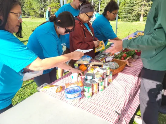 Teams plate their creations for the judges at Backcountry Iron Chef teambuilding challenge Banff and Canmore Canadian Rockies