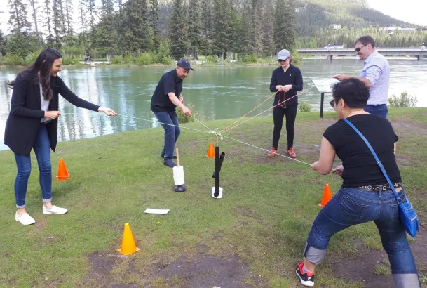 The Claw teambuilding game by the Bow River, Banff and Canmore Canadian Rockies