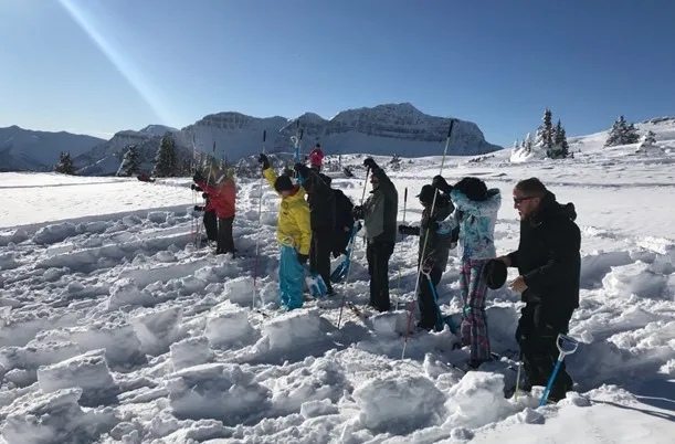 Group snowshoe teambuilding activity, Banff National Park Canadian Rockies