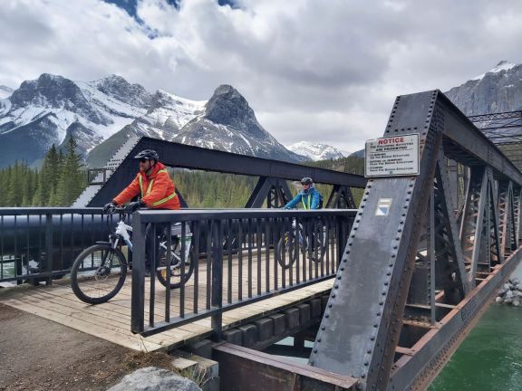 ebike rider at Canmore engine bridge