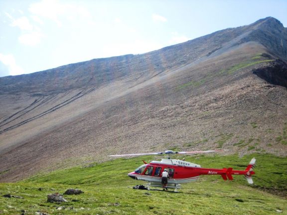 Heli Hiker boards helicopter in Canadian Rockies