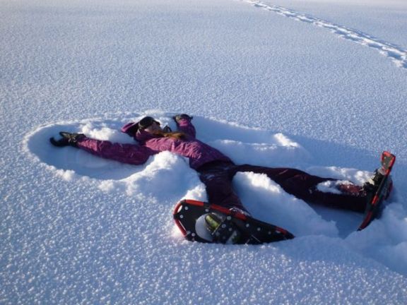 snowshoeing snow angel